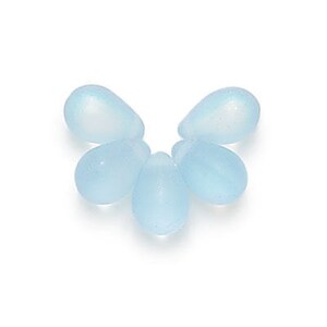 May include: Five light blue glass teardrop beads with a frosted finish.
