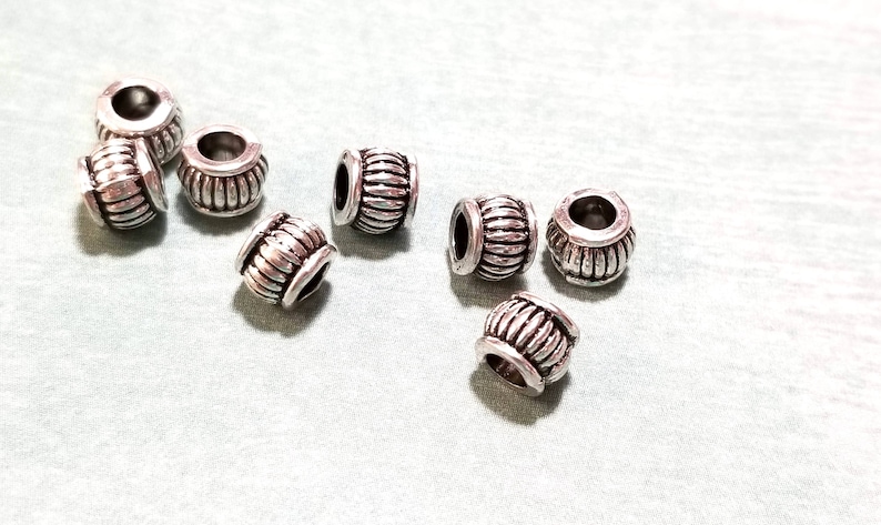 Antique Silver Rope Edged 5x6.5mm Barrel Spacer beads with an approx 20pcs Antique Silver Metal Beads Metal Spacers 3.2mm hole MB9052