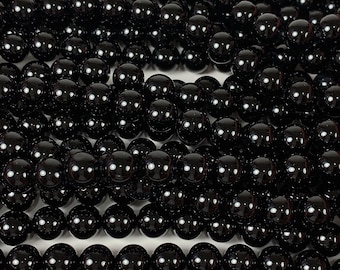 AAA Black Onyx Beads: 15.5&quot; Smooth Round Gemstone Strand