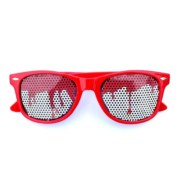Goteo de sangre roja de pintura roja en gafas de sol Wayfarer