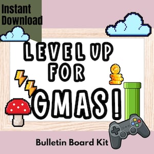 May include: A framed bulletin board kit with a gaming theme. The white board features pixelated graphics of a mushroom, lightning bolts, coins, a green pipe, a controller, and clouds. Text reads "LEVEL UP FOR GMAS!" and "Bulletin Board Kit."