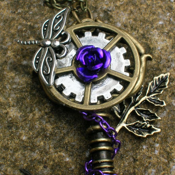 steampunk fantasy dragonfly key pendant. Choice colours