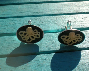 Bat or octopus cufflinks. goth.