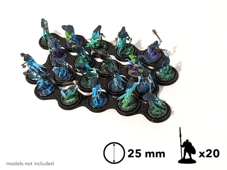 May include: A set of 20 black plastic bases for miniature figures. Each base is 25 mm in diameter and features a textured surface. The bases are arranged in a curved pattern and are ideal for displaying or storing miniature figures.