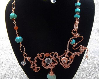Love is a many splendored thing...but it's complicated ... copper necklace set