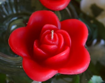 10 Red floating rose wedding candles for table centerpiece and reception decor.
