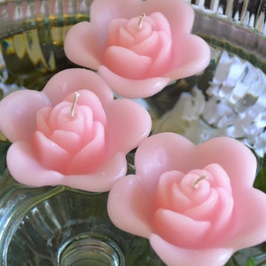 10 LIght pink floating rose wedding candles for table centerpiece and reception decor.