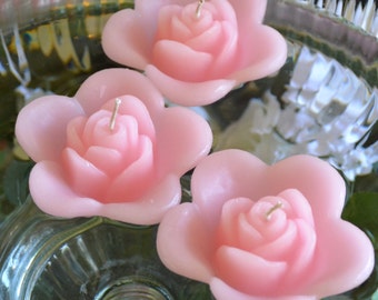 10 LIght pink floating rose wedding candles for table centerpiece and reception decor.