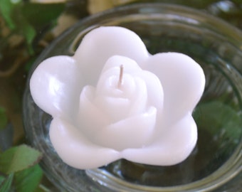 10 White floating rose wedding candles for table centerpiece and reception decor.