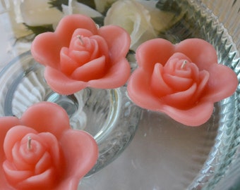 10 Coral Reef floating rose wedding candles for table centerpiece and reception decor.