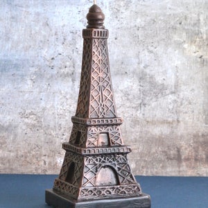 Eiffel Tower Candle with oil rubbed broze finish.