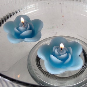 10 Turquoise floating rose wedding candles for table centerpiece and reception decor.