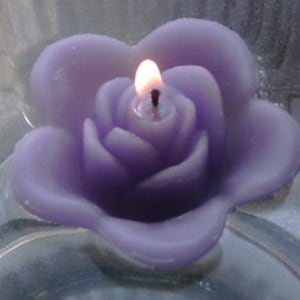 10 Lavender floating rose wedding candles for table centerpiece and reception decor.