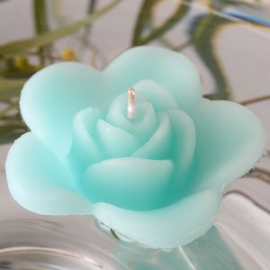 10 Spa floating rose wedding candles for table centerpiece and reception decor.
