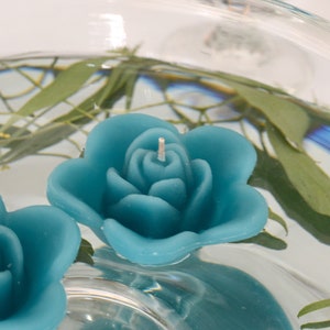 10 Teal floating rose wedding candles for table centerpiece and reception decor.