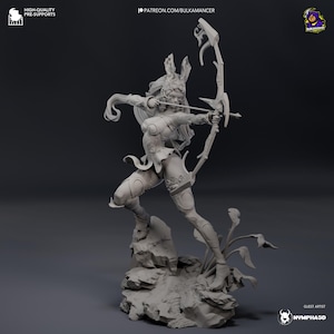 May include: A 3D printed figurine of a female archer with a bow and arrow. She is wearing a detailed outfit with a skirt and leggings. The figurine is posed in a dynamic action pose, with the archer aiming her bow and arrow. The figurine is printed in a light gray color and is set on a base with a rocky texture.