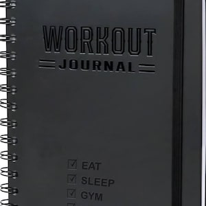 May include: Black spiral-bound workout journal with the words "WORKOUT JOURNAL" embossed on the cover. The journal includes a black elastic band closure and a ribbon bookmark. The bottom of the cover has the words "EAT, SLEEP, GYM, REPEAT" with check boxes.