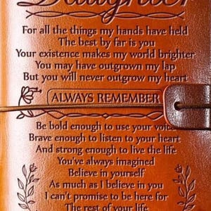 May include: A brown leather journal with the words "To my Daughter" embossed on the cover. The journal contains a heartfelt message from "Love, Dad" with inspirational quotes. A thoughtful gift.