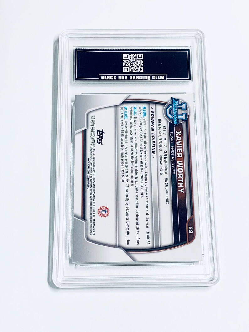 May include: A graded sports trading card featuring Xavier Worthy, a wide receiver from Texas. The card is encased in a clear plastic holder and includes text about the player's stats and achievements. The card is from the Bowman series.