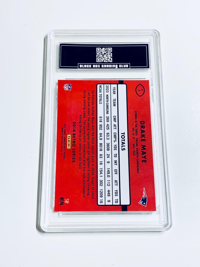 May include: A graded Drake Maye football card from the 2014 Retro Series. The card has a red background with player stats and the Patriots logo. It's encased in a clear protective holder by Black Box Grading Club.