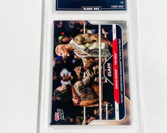 Roman Reigns/The Rock Limited Edition 1 von 16878 2025 Topps Now WWE # 3 “Tribal Chief” Benotet mit 10