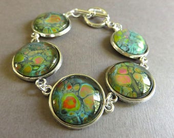 Blue green red fluid art glass cabochon bracelet. Wearable art. Flow art bracelet. Poured paint bracelet. Paint pour bracelet jewelry B18001