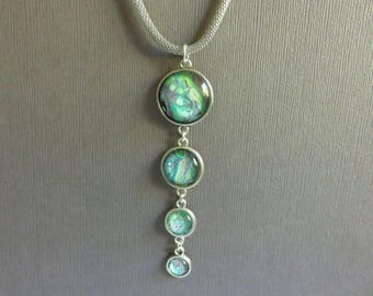 Quadruple cabochon aqua fluid art pendant necklace. Flow art pendant necklace. Pale aqua paint poured necklace. Wearable art necklace.