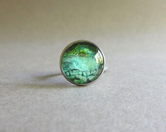 Aqua green fluid art adjustable ring. Flow art aqua green stainless steel adjustable fun ring. Wearable art pour paint ring. Paint pour ring