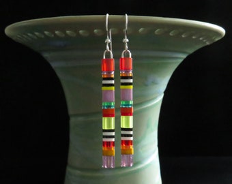 Long Tila multicolored glass bead stacked matchstick earrings. Lightweight colorful rainbow earrings. Matchstick earrings. Pride earrings.