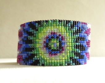 Delica glass bead tie dye loom beaded bracelet. Slinky rainbow bead loom cuff bracelet. Delica bead loom bracelet. Free shipping.