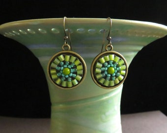 Aqua and lime green hand beaded mosaic mandala earrings. Beaded mandala mosaic earrings. Turquoise and chartreuse hand beaded earrings.