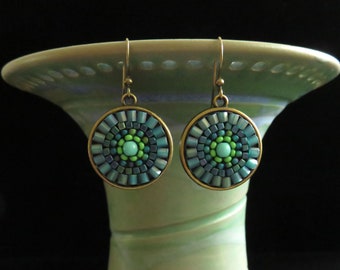 Aqua bead mandala medallion earrings. Bead woven mosaic mandala aqua glass bead earrings. Hand made beaded earrings. Aqua mandala earrings.