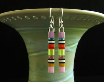 Multicolored Tila glass bead medium length earrings. Colorful rainbow earrings. Lightweight pride earrings. Multicolored glass bead earrings