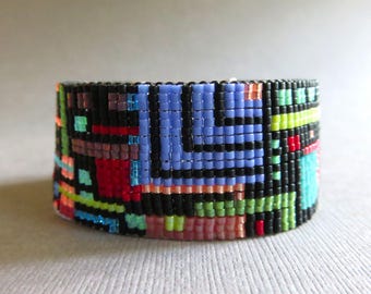 Black and bright Delica glass bead loomed bracelet. Handmade Delica glass bead slinky bracelet. Colorful glass bead bracelet. Free shipping.