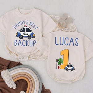 Personalized Police Baby Romper – Daddy’s Best Backup, First Birthday Outfit, Custom Law Enforcement Gift, Police Car Baby Clothes