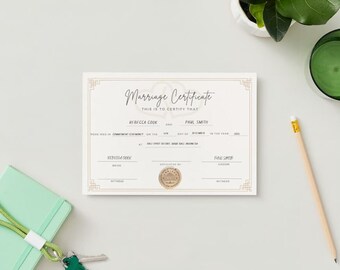 May include: A white marriage certificate with gold accents. The text reads "Marriage Certificate" and "This is to certify that." The names "Rebecca Cook" and "Paul Smith" are listed as the bride and groom. The certificate is decorated with a gold heart design.