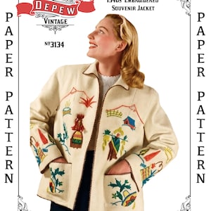 May include: A cream-colored jacket featuring colorful embroidery of various scenes and objects, including a sombrero, a person carrying items, and mountain motifs. The jacket has a collar, two front pockets, and dark brown decorative trim.