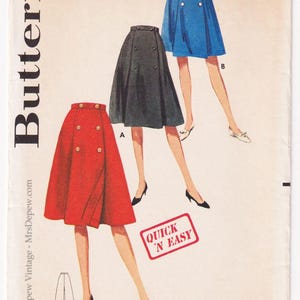 May include: Vintage Butterick sewing pattern featuring three skirt designs in red, charcoal, and blue. The pattern includes measurements for a 35-inch hip and a 25.5-inch waist. The text "Quick 'N Easy" is displayed in a red box.