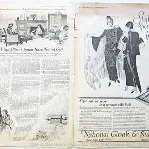 May include: A black and white magazine advertisement for National Cloak & Suit Co., a style specialist since 1888. The ad features two women in fashionable dresses and the text "Style has no secret to a woman with taste".