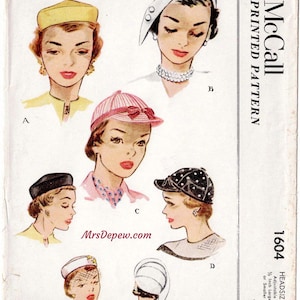 May include: A McCall printed pattern envelope 1604 for hats, featuring illustrations of six different hat styles labelled A, B, C, and D. The cover includes the text 'Women's and Misses' Hats', 'McCall Printed Pattern', and 'Headsize Adjustable 1/2 Inch Larger or Smaller'.
