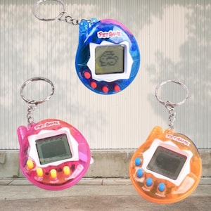 168-in-1 Virtual Pet Game, Transparent Digital Pet Toy, Retro Pixel Handheld Keychain, Nostalgic Electronic Toy Gift