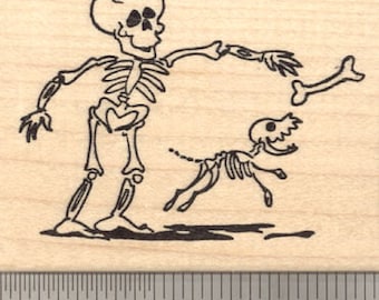 May include: A black and white rubber stamp featuring a skeleton holding the leash of a smaller skeleton dog. The skeletons are walking together.