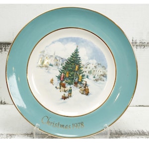 AVON Jahresweihnachtsplat 1978, der den Weihnachtsbaum schneidet