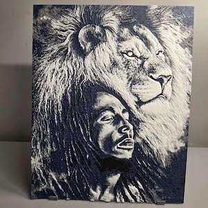 Image imprimée en 3D de Bob Marley et Lion.