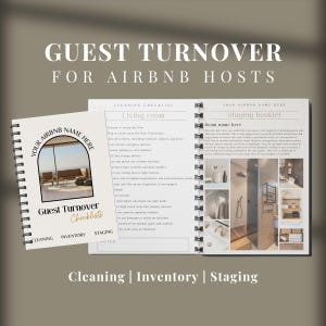 May include: A two-page spread of a spiral bound notebook with checklists for cleaning, inventory, and staging a guest room for Airbnb hosts. The notebook has a light brown cover with a photo of a living room with a large window and a couch. The text on the cover reads "Guest Turnover Checklists". The notebook is open to two pages, one titled "Cleaning Checklist" and the other titled "Staging Booklet". The "Cleaning Checklist" page has a list of tasks for cleaning a living room, including vacuuming, dusting, and cleaning windows. The "Staging Booklet" page has a list of tips for staging a guest room, including adding personal touches and making the room feel welcoming.