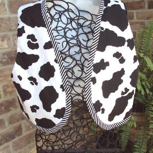 A   Adult cow  print vest--Woody impersonator, adult sizes XXS to Large