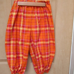 Knickers for Newsies, clowns, The Wiz,    adult sizes  Orange and red plaid