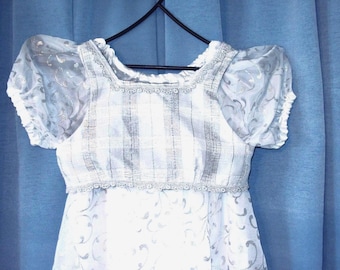 Disfraz de princesa para niña: chaleco reversible, tocado de halo y vestido de ángel.