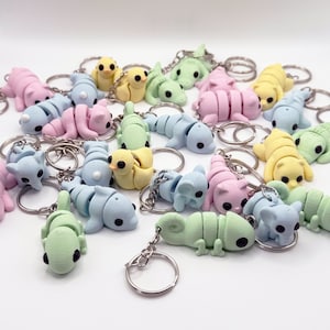 Micro-paquets de porte-clés animaux articulés flexibles imprimés en 3D pastel