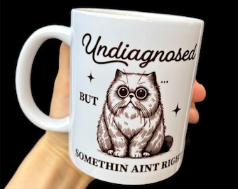 undiagnosed but something aint right mug, funny meme mug, autism meme, funny autism gift, adhd meme gifts, neurospicy, funny cat mug
